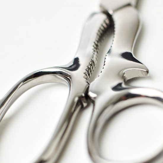 Our stainless steel Classic Kitchen Scissors in detail. Featuring a notch for cutting through bones, an integral bottle and tin opener and a built-in nutcracker function, these multipurpose kitchen scissors are a culinary must-have.
